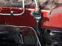 CRW 11897  fire wall to engine clutch link.