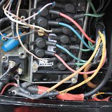 IMG 260363  The new switch box fitted with, on the left hand side, the new wires coming from the ignition module. After fitting a new rectifier the battery was still not charging. Reason: again wire rot in the alternator wires (yellow).